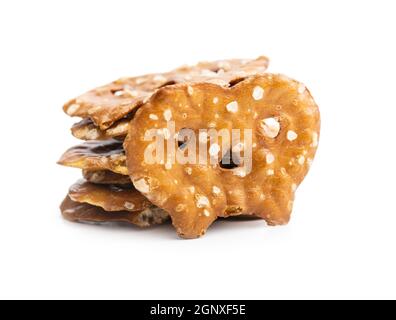 Salted mini flat pretzels isolated on white background. Stock Photo
