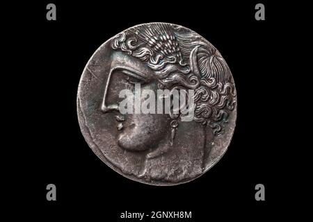 Silver 5 shekel Carthaginian coin replica with portrait of Tanit the sky goddess and the winged horse Pegasus on the reverse from the First Punic War Stock Photo