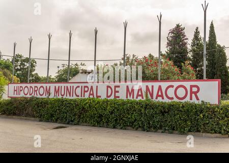 Manacor, Spain; september 25 2021: Poster of the municipal Hippodrome of the Majorcan town of Manacor written in Catalan language. Currently Covid-19 Stock Photo
