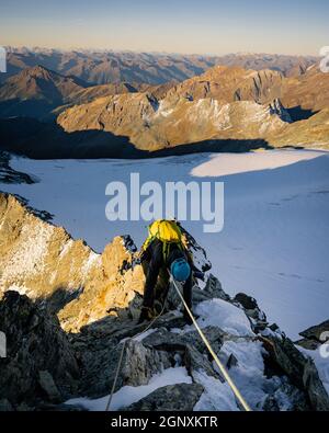 Rock climber on Studlgrat ridge on