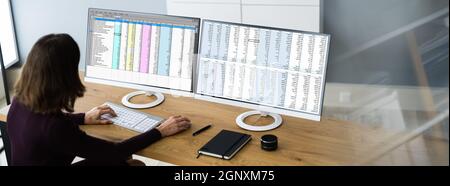 Analyst Employee Working With Spreadsheet On Computer Screen Stock Photo