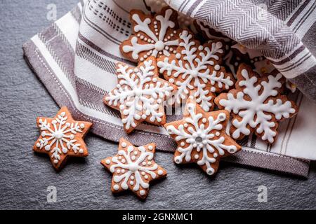 side view of gingerbread cookies on napkin on the slate table Stock Photo