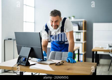 Professional Workplace Janitor Service. Office Desk Cleaning Stock Photo