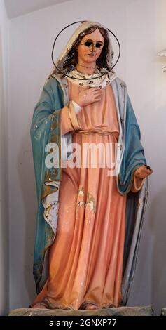 Virgin Mary with eyes gouged out, devastated on 13 January 1992 by Serbia and Montenegro invaders having previously burned Cilipi, Church of St. Nicho Stock Photo
