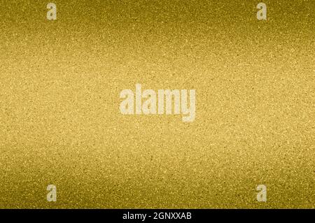 Granite background of yellow color with small dots. Darkening. Stock Photo