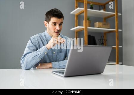 Virtual Smoking Break Using Electronic Cigarettes And Video Conference Stock Photo