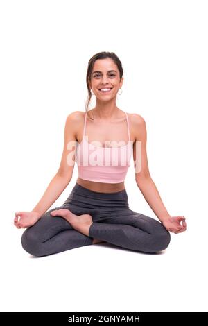 Sporty young woman doing yoga practice isolated on white