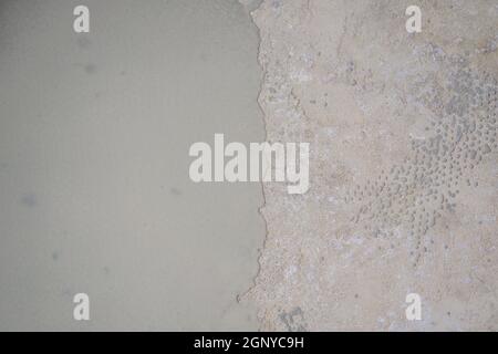 floor partially covering with self-levelling cement mortar Stock Photo