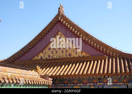 Tiled roof and facade decorated with a Chinese pattern. Palace in The Forbidden City, Beijing, China Stock Photo