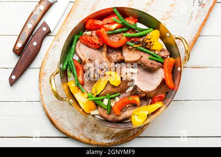 Boiled beef tongue with bell pepper.Sliced beef tongue Stock Photo