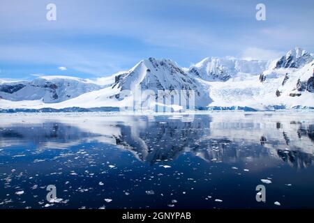 Wilhelmina Bay is a bay 24 kilometres (15 mi) wide between the Reclus Peninsula and Cape Anna along the west coast of Graham Land on the Antarctic Pen Stock Photo