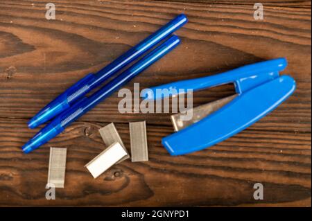 Stationery stapler, stapler staples, close-up selective focus Stock Photo