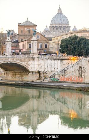 Rome, Italy - January 04, 2015:  bridge on tevere river in rome near vatican with people walking on bridge Stock Photo