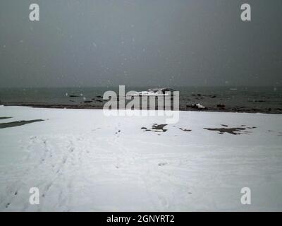 Snow on the shore of the Caspian Sea. Kazakhstan. Mangistau region. 09 February 2020 year. Stock Photo