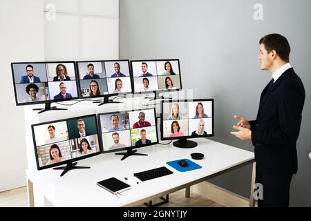 Elearning Training Presentation Using Videoconference With Virtual Audience Stock Photo