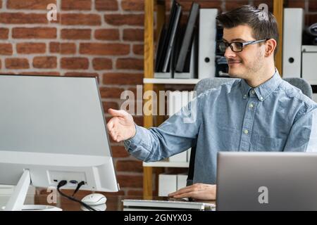 Virtual Personal Assistant Man Making Video Conference Call Stock Photo