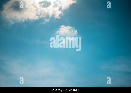 hazy blue sky with a few clouds for backgrounds Stock Photo