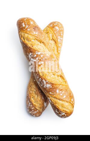 Two crispy fresh baguettes isolated on a white background. Stock Photo