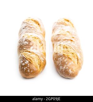 Two crispy fresh baguettes isolated on a white background. Stock Photo
