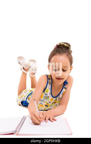 Young girl making some draws - isolated over white Stock Photo