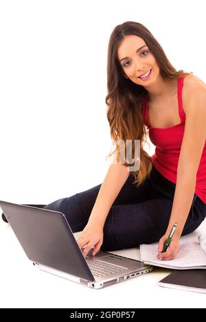 Young girl studying - isolated over white background Stock Photo