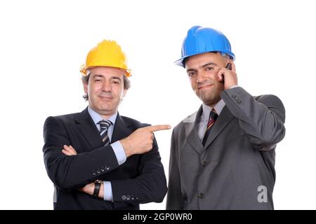 Two Engineers or Architects, discussing new project, isolated in white background Stock Photo