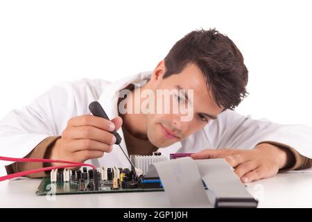 Happy and successful young computer engineer Stock Photo