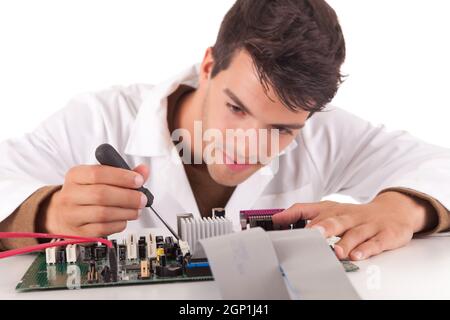 Happy and successful young computer engineer Stock Photo