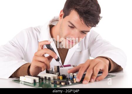Happy and successful young computer engineer Stock Photo