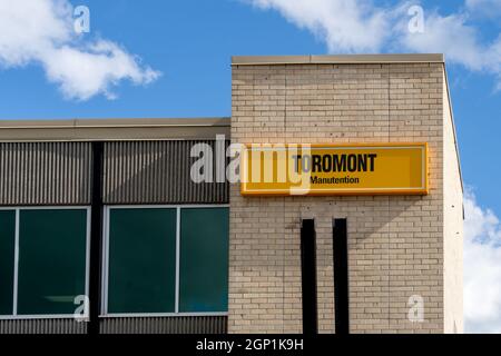 Pointe-Claire, QC, Canada - September 3, 2021: Toromont Manutention sign on the building in Pointe-Claire, QC, Canada. Stock Photo
