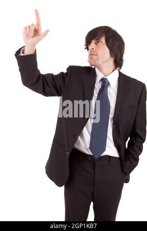 Young businessman pressing key, isolated over white Stock Photo