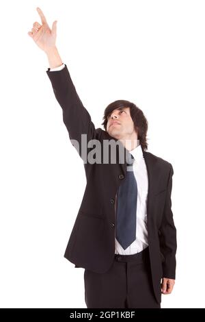 Young businessman pressing key, isolated over white Stock Photo