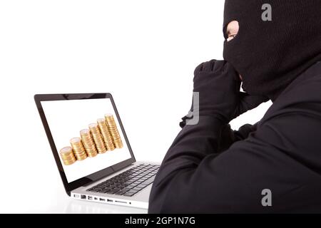 Disguised computer hacker Stock Photo