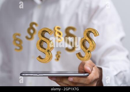 3d rendering of golden law paragraph symbols over a smartphone in a human hand on a white background Stock Photo