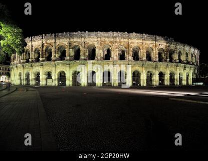 Brightly Lit Ancient Roman Arena Of Nimes France In The Night Stock Photo