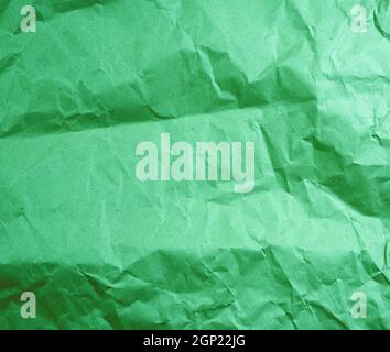 green crumpled paper, full frame, close up Stock Photo