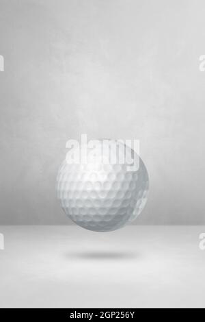 White golf ball isolated on a blank studio background. 3D illustration Stock Photo