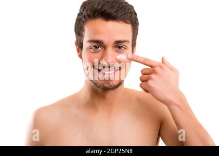 Handsome man applying - anti-aging concept Stock Photo