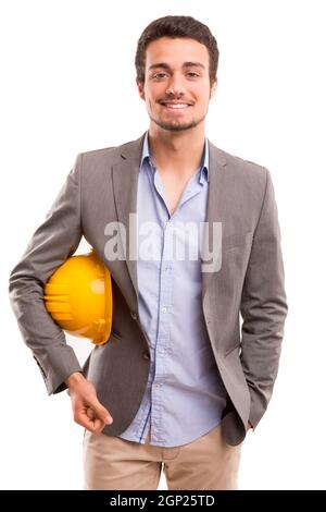 Handsome young engineer posing isolated over white background Stock Photo
