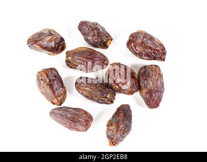 bunch of dried dates isolated on white background, top view Stock Photo