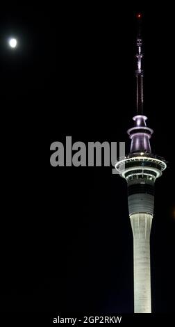 Sky Tower and moon. Auckland. North Island. New Zealand. Stock Photo