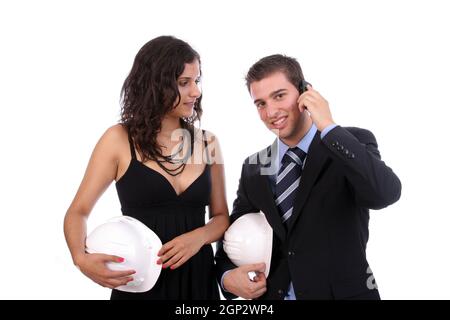 Two Engineers or Architects, on the phone, isolated in white background Stock Photo