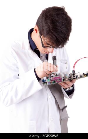 Computer engineer working on an old motherboard Stock Photo