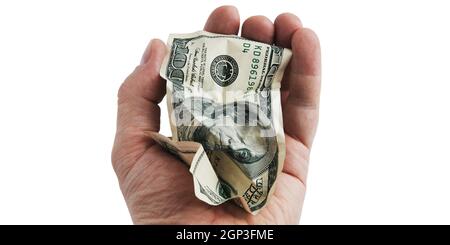A crumpled hundred-dollar cash bill in his hand. Isolated on a white background. Stock Photo