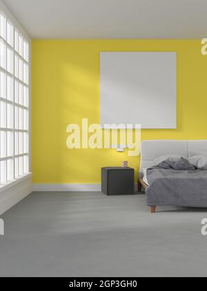 Modern grey bedroom with a blank poster on a yellow wall Stock Photo
