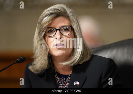 Sen. Joni Ernst, R-Iowa, speaks to reporters at the Capitol in ...