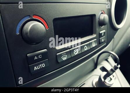 Closeup of air conditioning control buttons inside the car. Stock Photo