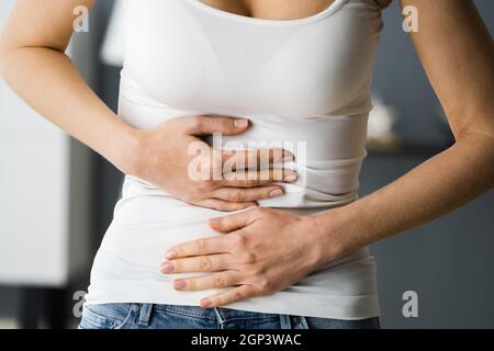 Incontinence, Constipation, Menopause Or PMS Stomach Pain Stock Photo