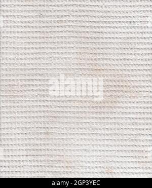 Background of natural cotton fabric. Closeup view of grey waffle fabric as texture. Fabric texture. Product of textile industry Stock Photo