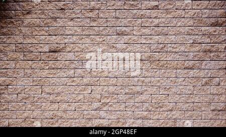 Brown rock stone Seamless texture, background, stone lined  walls. sandstone. stone background wall. Facing Stone .Architecture design . for photoshop Stock Photo